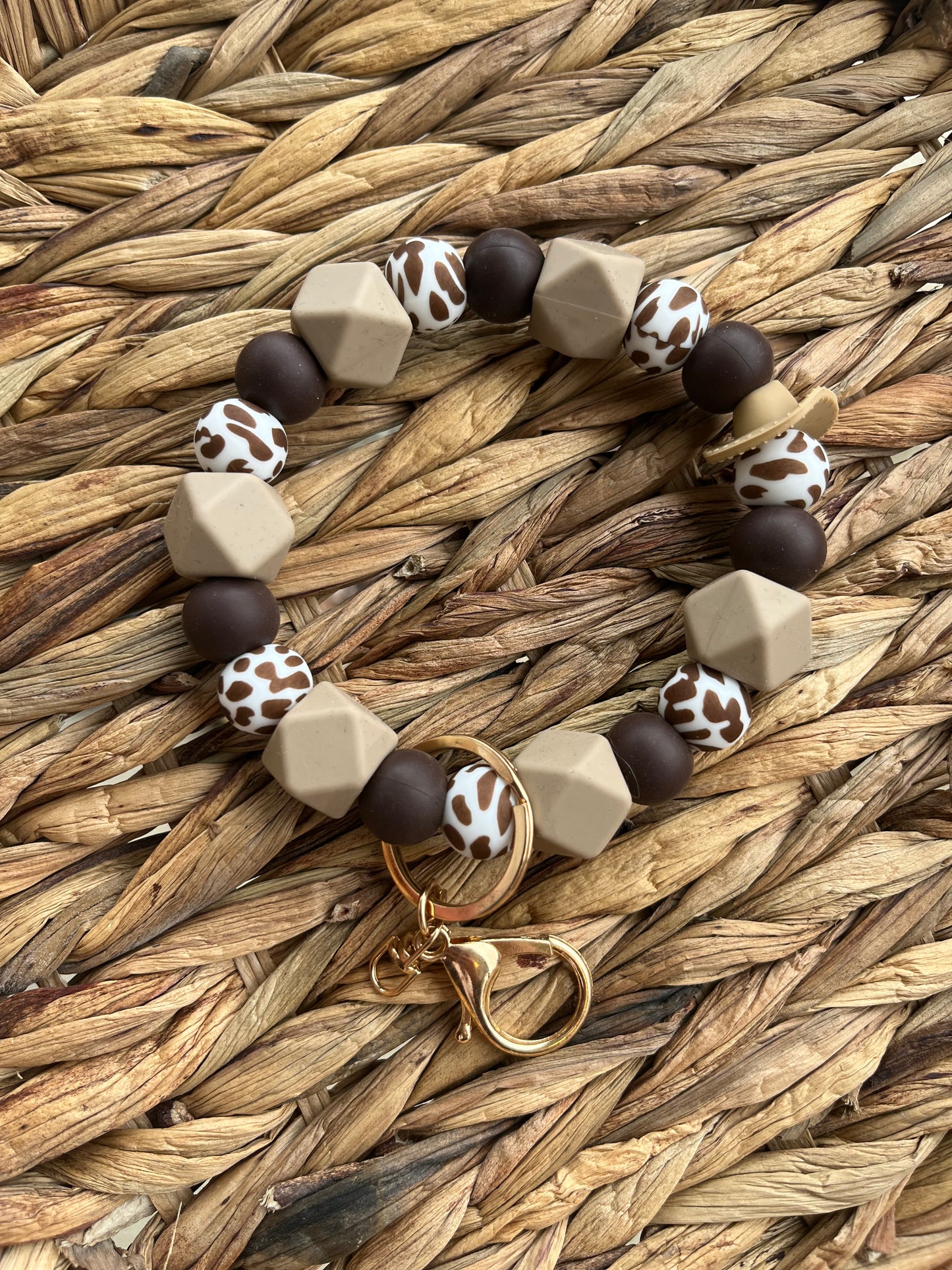Brown cow print wristlet